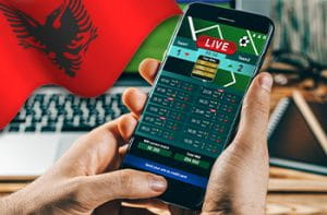 Smartphone con scommesse sportive, bandiera albanese