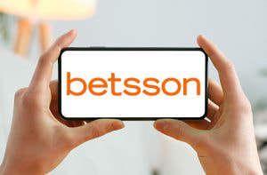 Smartphone e logo di Betsson